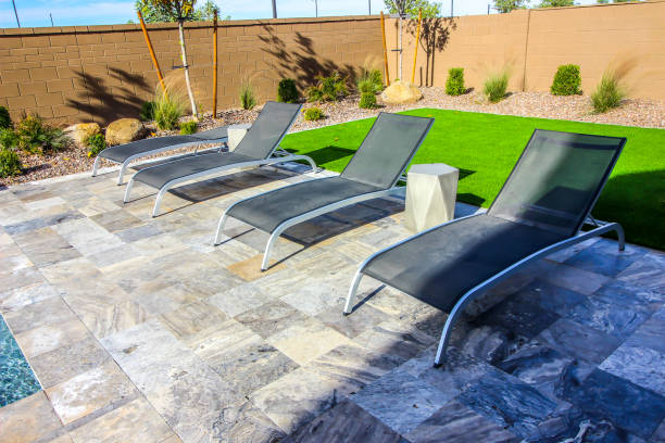 istock Four Lounge Chairs On Back Patio 1898397939