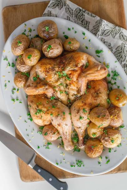 istock Roasted Spatchcock Chicken served with Roasted Potatoes 1898552840