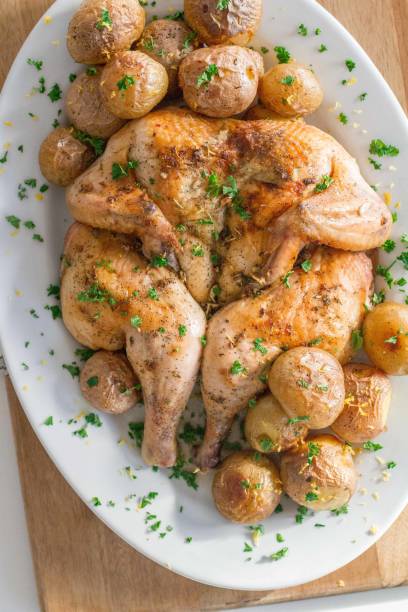 istock Roasted Spatchcock Chicken served with Roasted Potatoes 1898552845