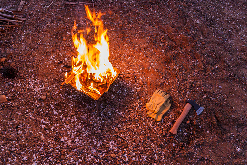 Outdoor bonfire at sunset