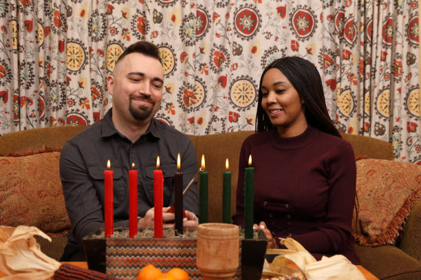 istock Kwanzaa Couple Person Lights MS Horizontal 1898804230
