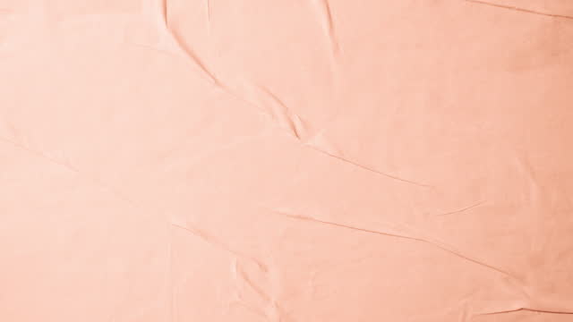 Random peach color wheatpaste paper poster texture background