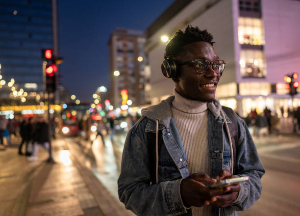 istock Handsome black man using phone in the city 1898960761