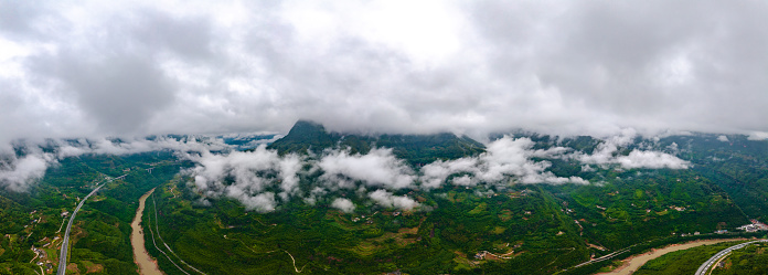 Aerial photography of mountain forest, cloud and fog panorama
