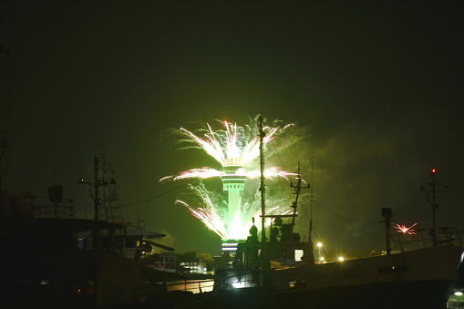 new year fireworks on Samut Prakan city town skyscraper new landmark in Thailand on midnight