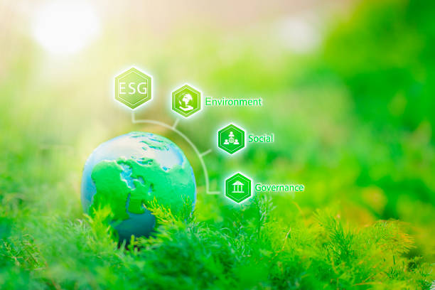 ESG. environment social governance investment business concept. Businessmen use a computer to analyze ESG, surrounded by ESG icons close to the computer screen in business investment strategy concept.