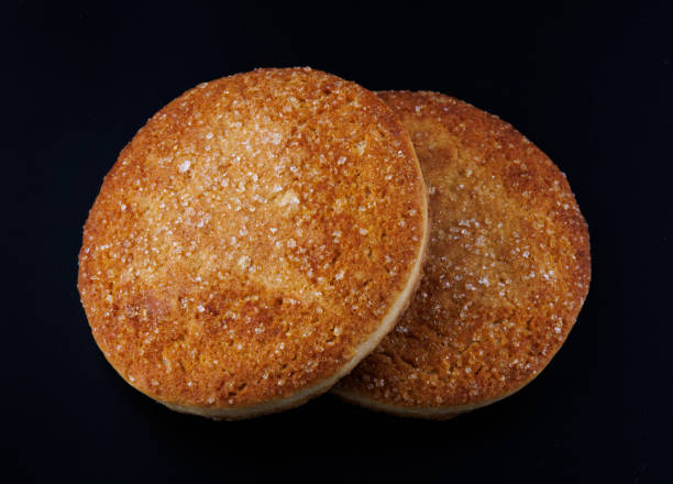 istock eautiful round cookies on a black background. A few cookies. Two cookies. 1899058943