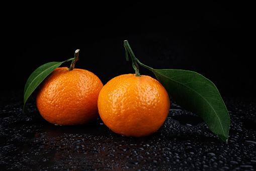 Oranges on a black background
