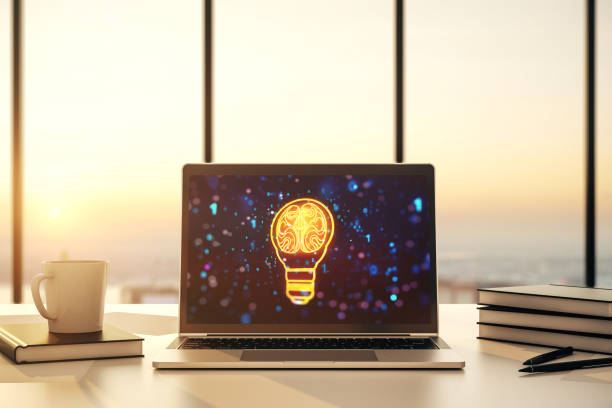 istock Modern computer monitor with creative light bulb hologram with human brain, idea and brainstorming concept. 3D Rendering 1899075221