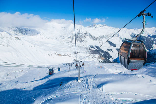 Explorer hiking at Jungfraujoch, The top of Europe, Switzerland. The surface of snow full of the marks of the tractor.