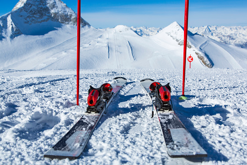 Skis and ski poles on top of ski resort Hintertux, Tirol, Austria.