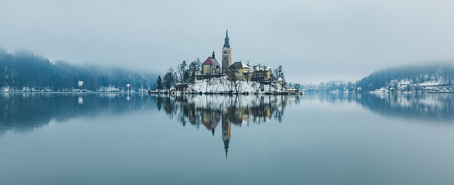 Hohenkammer, Germany – March 13, 2022: The 17th century moated castle. Owned by Munich Re AG, today it contains a conference center and restaurants.