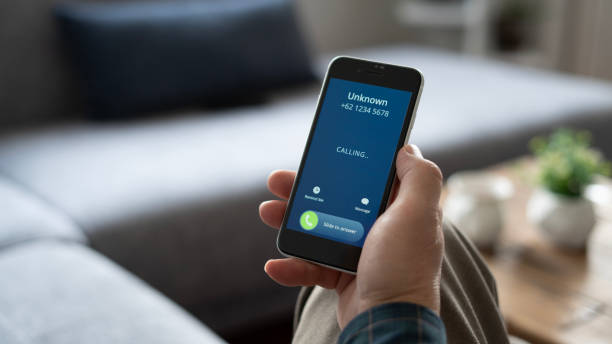 istock Close-up Unknown number call to senior man at home 1899222779