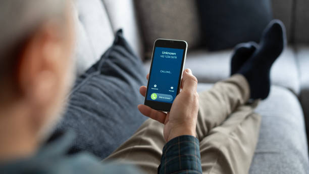 istock Close-up Unknown number call to senior man at home 1899222780