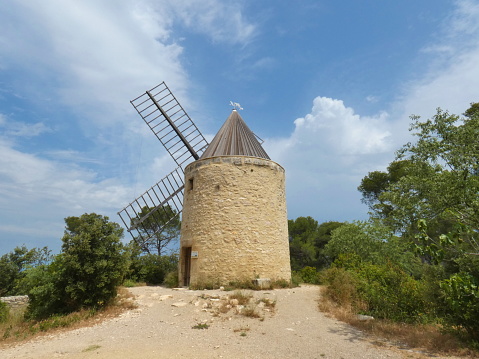 Magnificent photo of the Tissot-Avon mill which is one of the Fontvieille mills. This windmill was completely renovated in 2016. This photograph was taken in the Alpilles in Fontvieille in Provence.