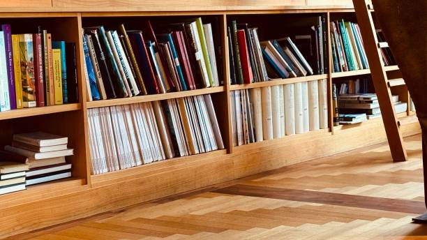 istock Book shelves and ladder, parquet floor 1899286997