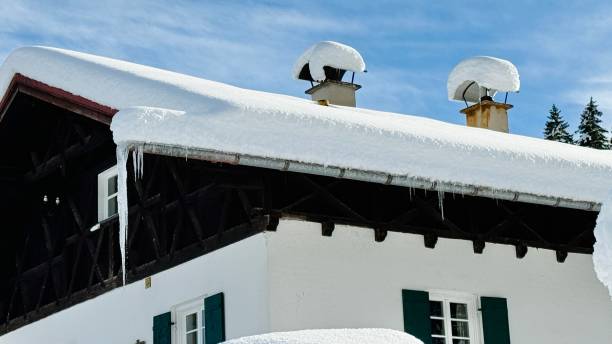 Roof covered with snow on a winter evening.