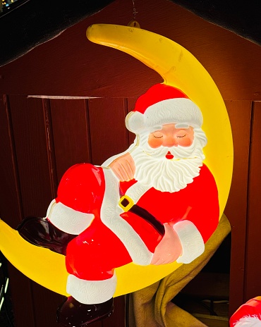 Sleeping santa claus on the moon