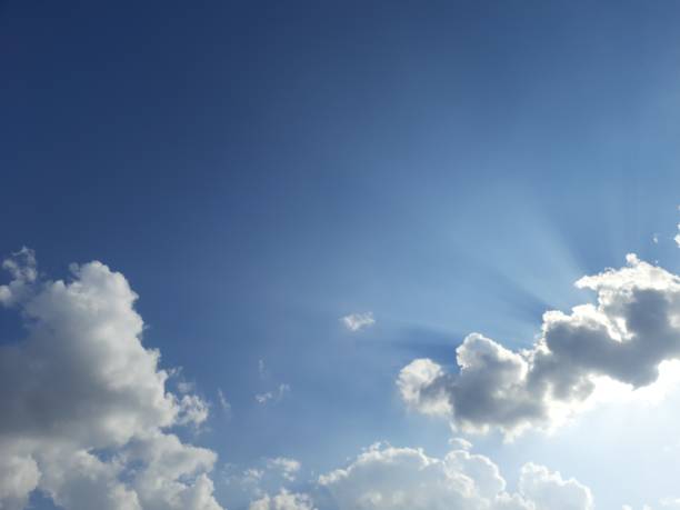 istock Beautiful white clouds in a blue sky on a sunny afternoon 1899335883