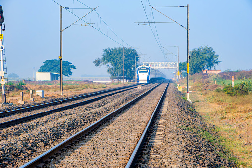 Pune, India - December 31 2023: The Solapur Mumbai Vande Bharat Express Train heading towards Mumbai, near Pune India.