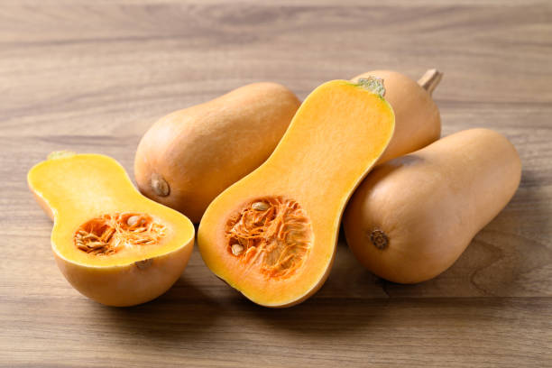 istock Butternut squash pumpkin on wooden background 1899364887