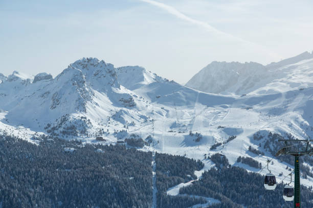 istock Skiers skiing at winter ski resort 1899440007