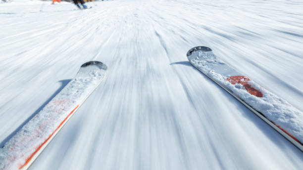istock Skier skiing at winter ski resort 1899455114