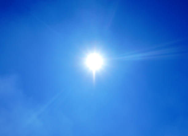 istock Clouds in the blue sky with sunny background. Blue sky with white clouds Bright sun background. 1899484706