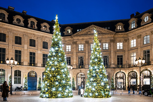 Place Vendôme during Christmas, with beautiful Christmas tree in Paris, France - December 11, 2023