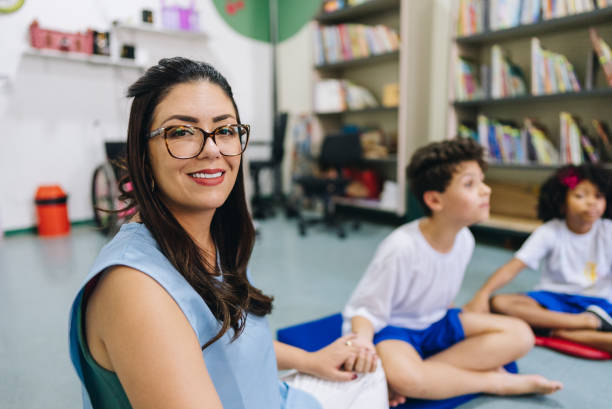 istock Portrait of a teacher at school 1899577151