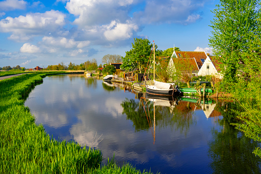 Small village of Driehuizen, Netherlands, along a canal.