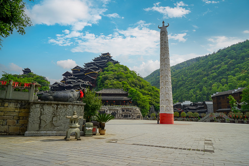 The Jiuli Divine Pillar is currently the tallest Miao totem pole in the world. Chiyou Jiuli City integrates Miao culture and architecture. Chongqing, China.