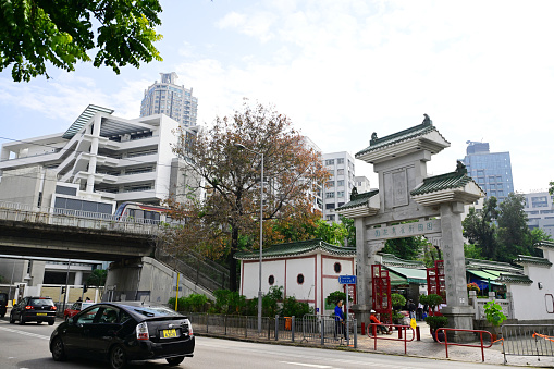 Hiroshima, Hiroshima Prefecture, Japan - October 9, 2021: People at the trolley stop in front of the Former Bank of Japan Hiroshima Branch, one of the few buildings to survive near ground zero of the atomic bomb blast.