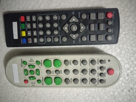 Universal remote control for old school televisions that cannot receive digital broadcast signals and remote control for set top boxes that capture and receive digital television broadcast signals