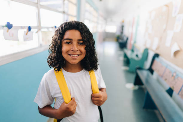 istock Portrait of a boy student at school 1899718848