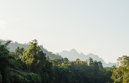 Landscape environment beautiful viewpoint summer season Nature look green rock mountains fog tree and blue sky in forest outdoor evening day sunlight fresh at Kanchanaburi Asia Thailand