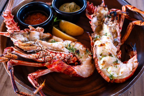 istock Grilled Caribbean Lobster Halves Served in a Restaurant 1899751482