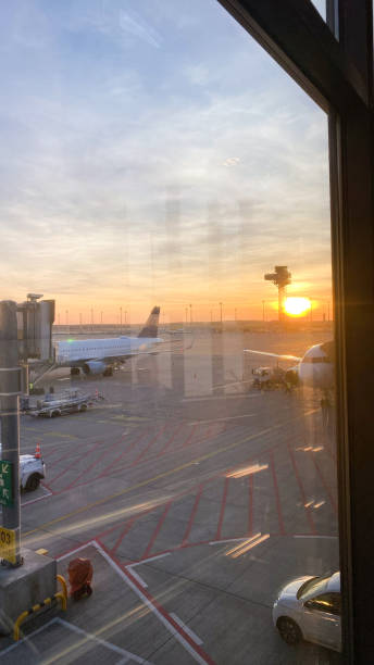 istock Airport Canvas: Airplanes Painting the Skyline 1899789945