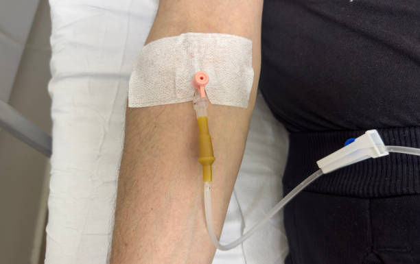 istock The patient's arm with a IV drip 1899818526