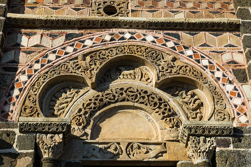Carved details of the entrance portal of Saint-Michel Church in Aiguilhe, near Le Puy-en-Velay, Auvergne