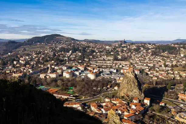 Photo of Panorama of Mont Denise, Polignac Castle, and Saint-Michel Church in Aiguilhe on its rock from Rocher Corneille in Le Puy-en-Velay, Auvergne