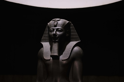Luxor, Egypt - January 2, 2024: Thutmose III or Tuthmosis III. King of Egypt Greywacke stone statue, Luxor Museum