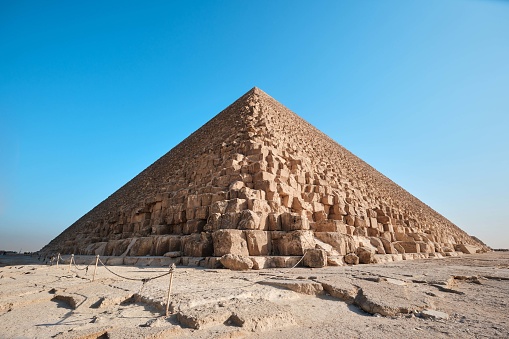 Giza, Egypt - December 24 2023: The Great Pyramid Khufu (Pyramid of Cheops) is the oldest and largest of the three pyramids in the Giza pyramid complex