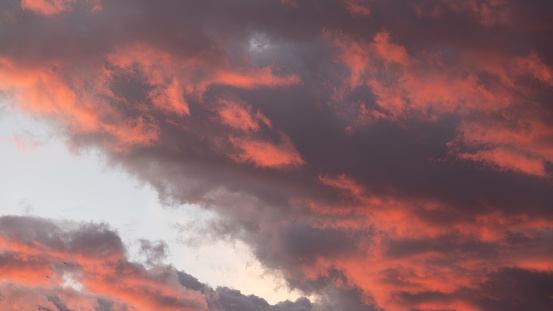 Dramatic sunset sky with red and orange clouds. Nature background