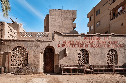 Luxor, Egypt - December 26 2023: New Gourna Village Hassan Fathy adobe house building on the west bank