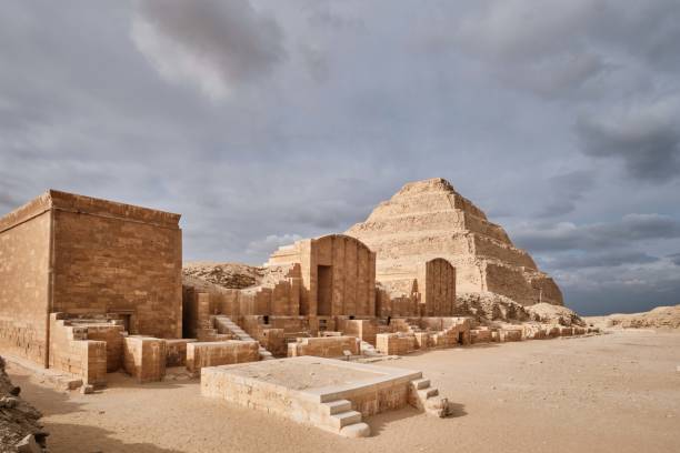 the pyramid of djoser (or djeser and zoser), or step pyramid in the saqqara necropolis, egypt - the step pyramid of zoser imagens e fotografias de stock