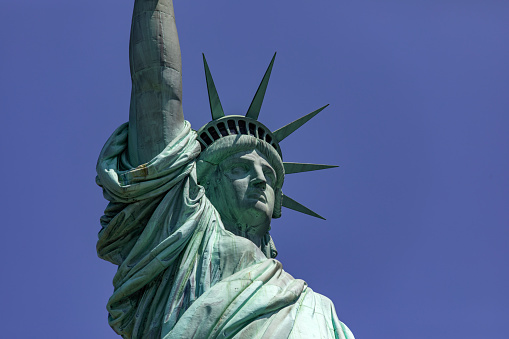 The Statue of Liberty with its crown is the democratic symbol of New York (USA) and the Big Apple.