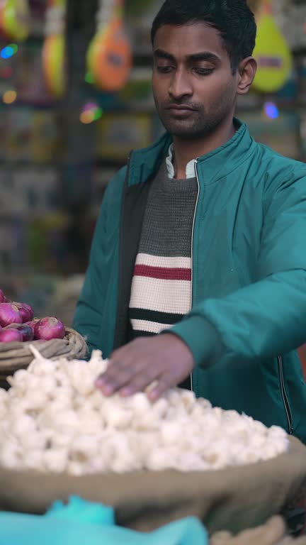 Greengrocer sell vegetables in the late afternoon onwards.