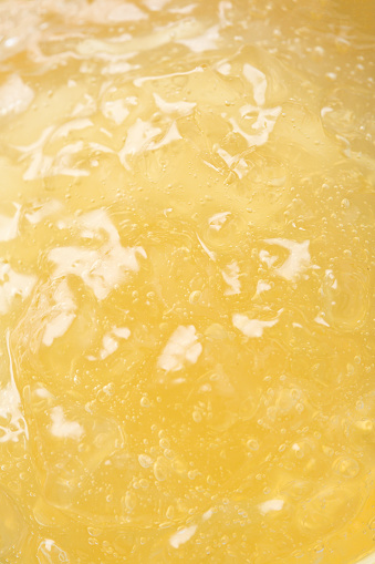 Yellow jelly texture collagen background