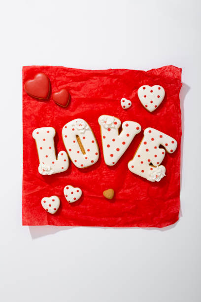 istock Valentine's Day Cookies hearts love letter on red paper 1900214256